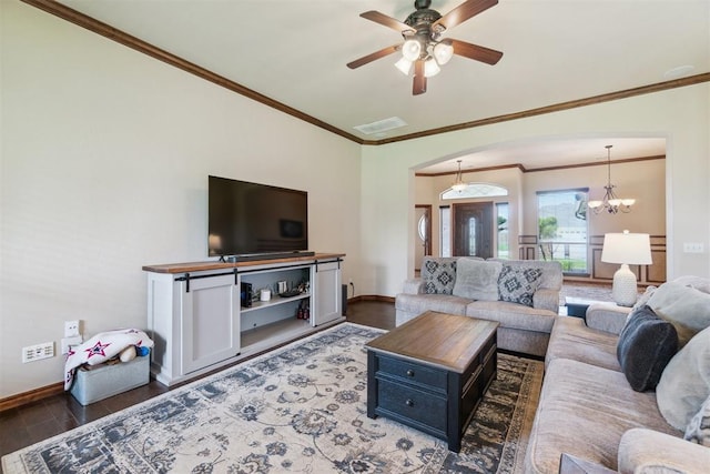 1600 SW 123rd St, Oklahoma City, OK 73170 - living room with crown molding, wood finished floors, ceiling fan, arched walkways, and a chandelier