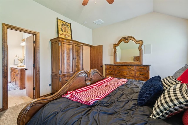 1600 SW 123rd St, Oklahoma City, OK 73170 - bedroom featuring light tile patterned floors, light colored carpet, lofted ceiling, and ceiling fan