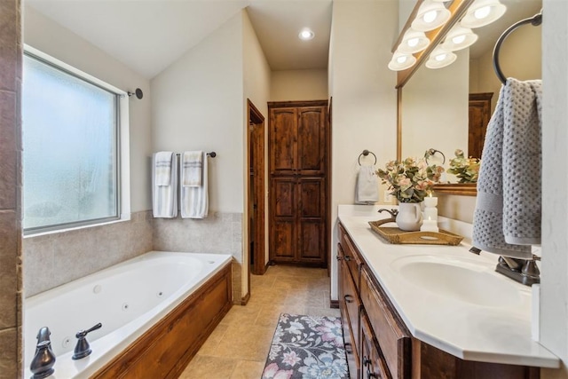 1600 SW 123rd St, Oklahoma City, OK 73170 - full bath with healthy amount of natural light, double vanity, a tub with jets, and tile patterned floors