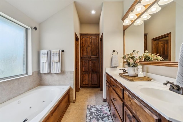 1600 SW 123rd St, Oklahoma City, OK 73170 - full bathroom featuring double vanity, a jetted tub, tile patterned flooring, and recessed lighting