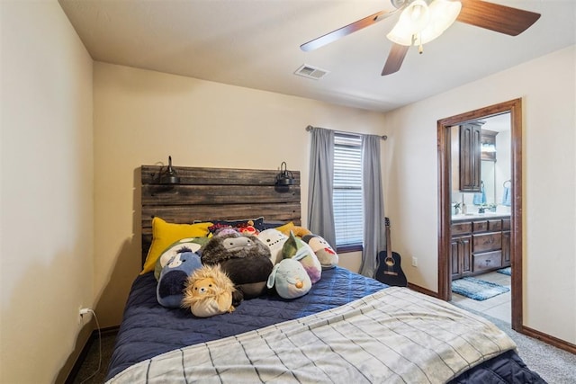 1600 SW 123rd St, Oklahoma City, OK 73170 - bedroom featuring carpet flooring, connected bathroom, and a ceiling fan