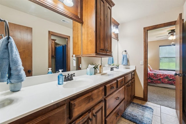 1600 SW 123rd St, Oklahoma City, OK 73170 - ensuite bathroom featuring double vanity, tile patterned floors, and ceiling fan