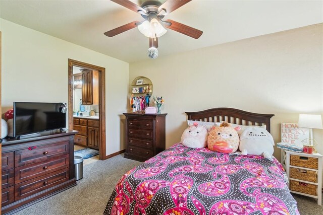 1600 SW 123rd St, Oklahoma City, OK 73170 - carpeted bedroom with ensuite bath and a ceiling fan