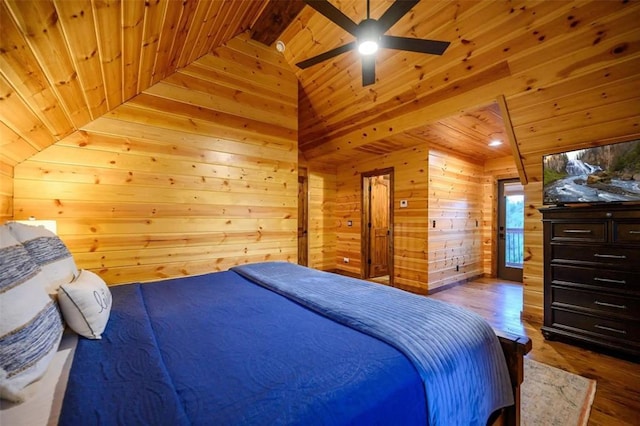 64 Mountain Alder Trl, Broken Bow, OK 74728 - bedroom featuring wood ceiling, wood walls, and wood finished floors