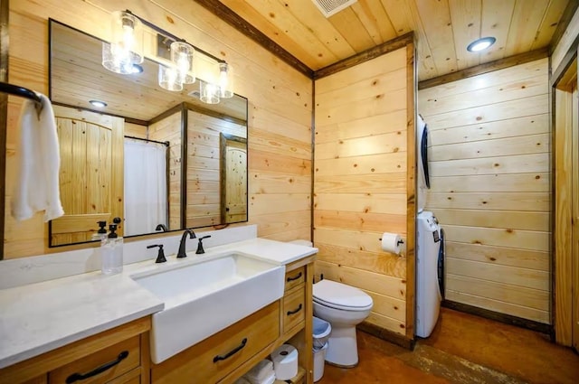 64 Mountain Alder Trl, Broken Bow, OK 74728 - full bath featuring wooden ceiling, wooden walls, vanity, stacked washing machine and dryer, and concrete floors
