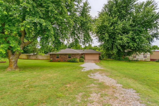 3414 Clayton Dr, Tuttle, OK 73089 - view of yard featuring driveway