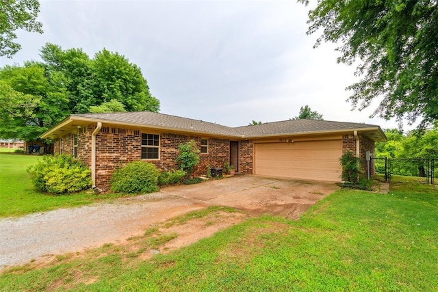 3414 Clayton Dr, Tuttle, OK 73089 - single story home featuring an attached garage, concrete driveway, and brick siding