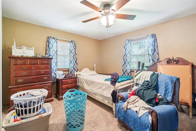 3414 Clayton Dr, Tuttle, OK 73089 - bedroom featuring multiple windows, carpet, and ceiling fan