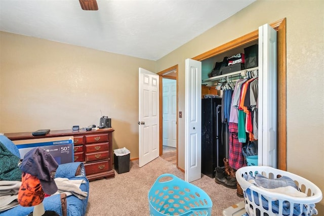 3414 Clayton Dr, Tuttle, OK 73089 - bedroom featuring light carpet, a closet, and a ceiling fan