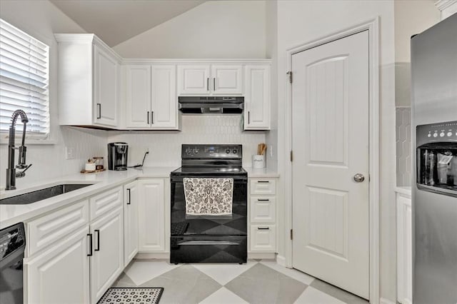 2336 NW 197th St, Edmond, OK 73012 - kitchen with black appliances, under cabinet range hood, white cabinets, vaulted ceiling, and light countertops