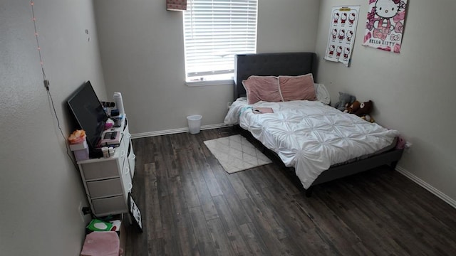 2628 N Ann Arbor Ave Unit 102, Oklahoma City, OK 73127 - bedroom featuring wood finished floors and baseboards