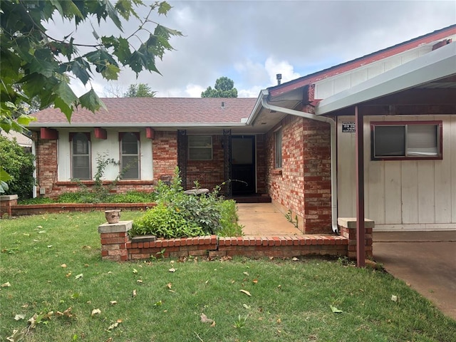 5517 S Karen St, Oklahoma City, OK 73135 - ranch-style house with a front lawn, brick siding, and roof with shingles