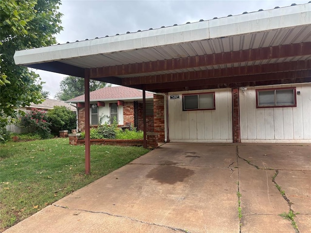 5517 S Karen St, Oklahoma City, OK 73135 - view of front of property with a front yard, an attached carport, and brick siding