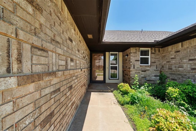 708 Cactus Ct, Yukon, OK 73099 - property entrance with a shingled roof