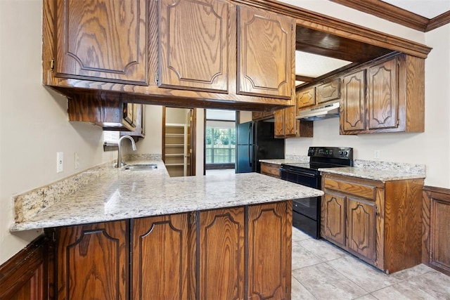 708 Cactus Ct, Yukon, OK 73099 - kitchen with black appliances, a peninsula, under cabinet range hood, ornamental molding, and light tile patterned floors