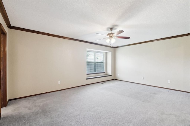 708 Cactus Ct, Yukon, OK 73099 - empty room featuring crown molding, ceiling fan, a textured ceiling, and light carpet