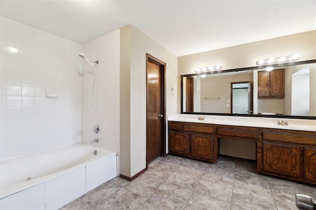 708 Cactus Ct, Yukon, OK 73099 - bathroom featuring shower / tub combination and double vanity