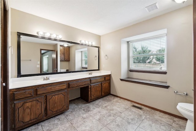 708 Cactus Ct, Yukon, OK 73099 - full bath with double vanity and toilet