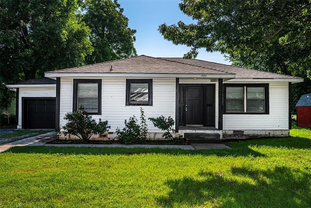 406 SW 4th St, Tuttle, OK 73089 - bungalow-style house featuring an attached garage, a front lawn, crawl space, and a shingled roof