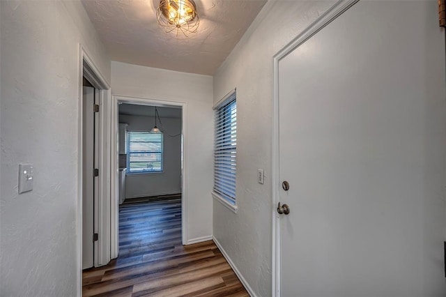406 SW 4th St, Tuttle, OK 73089 - hall featuring wood finished floors and a textured wall