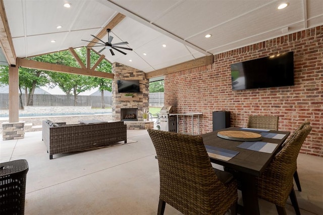5017 Yale Bridge Ct, Edmond, OK 73034 - view of patio / terrace featuring ceiling fan, a gazebo, outdoor dining area, a grill, and an outdoor living space with a fireplace