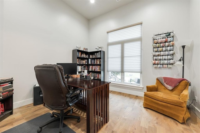 5017 Yale Bridge Ct, Edmond, OK 73034 - office featuring wood finished floors and vaulted ceiling