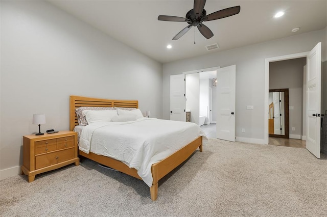 5017 Yale Bridge Ct, Edmond, OK 73034 - bedroom featuring light colored carpet, recessed lighting, and a ceiling fan
