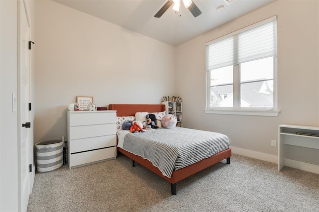 5017 Yale Bridge Ct, Edmond, OK 73034 - carpeted bedroom featuring a ceiling fan and baseboards