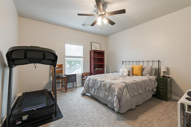 5017 Yale Bridge Ct, Edmond, OK 73034 - bedroom featuring light colored carpet and a ceiling fan
