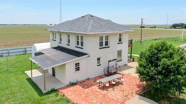 15274 US Highway 283, Blair, OK 73526 - rear view of house featuring a patio area, a view of rural / pastoral area, a metal roof, and a fenced backyard