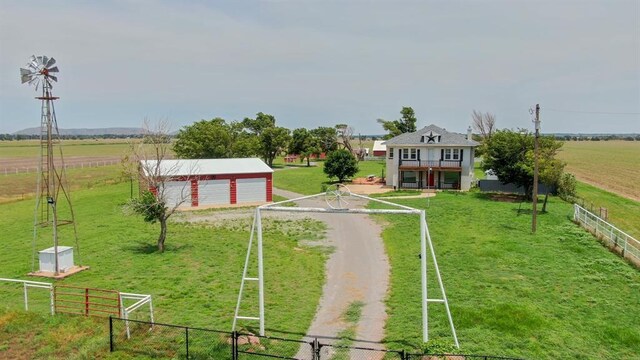 15274 US Highway 283, Blair, OK 73526 - view of community with dirt driveway, a view of countryside, a garage, and an outdoor structure