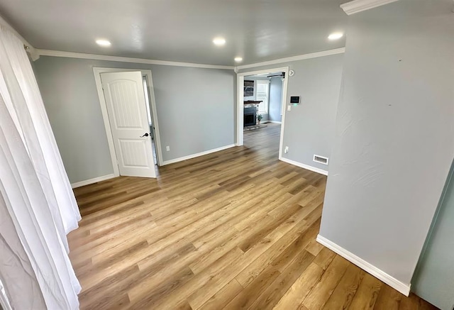 15274 US Highway 283, Blair, OK 73526 - spare room with ornamental molding, light wood-style floors, and recessed lighting