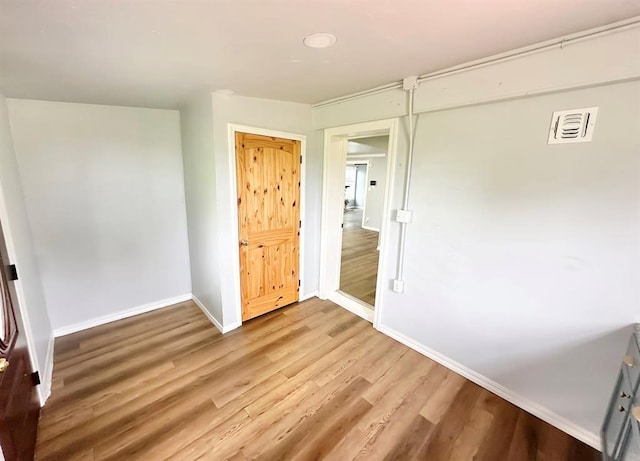 15274 US Highway 283, Blair, OK 73526 - spare room featuring baseboards and light wood-type flooring