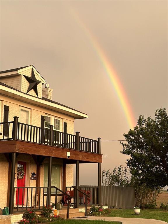15274 US Highway 283, Blair, OK 73526 - rear view of property featuring a balcony and a chimney