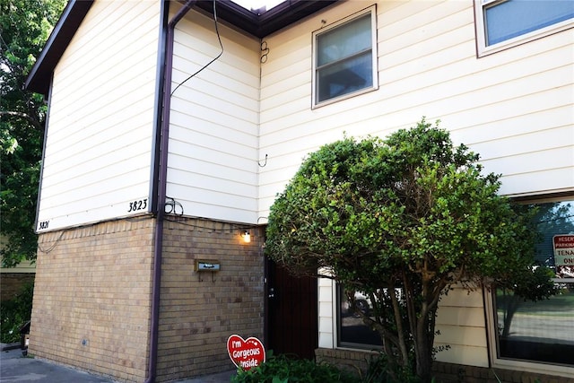 3823 N Harvard Ave Unit 12, Oklahoma City, OK 73122 - view of property exterior with brick siding
