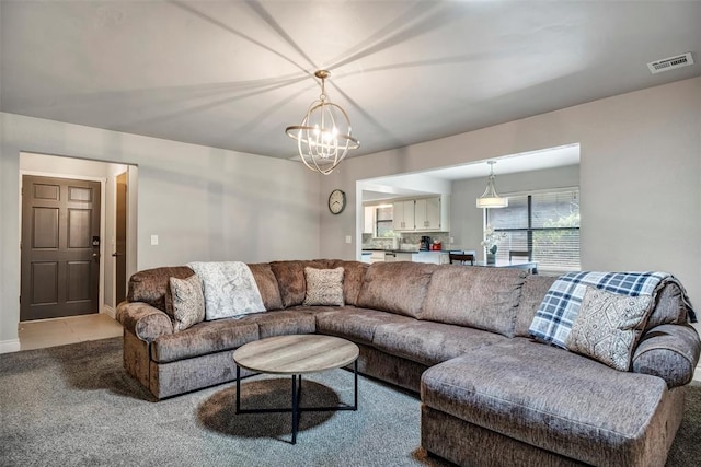 1713 Shadow Ct, Edmond, OK 73013 - living room with a chandelier and carpet flooring
