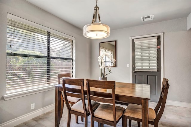 1713 Shadow Ct, Edmond, OK 73013 - dining area featuring baseboards