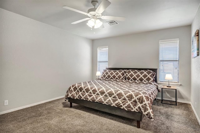 1713 Shadow Ct, Edmond, OK 73013 - carpeted bedroom featuring baseboards and a ceiling fan