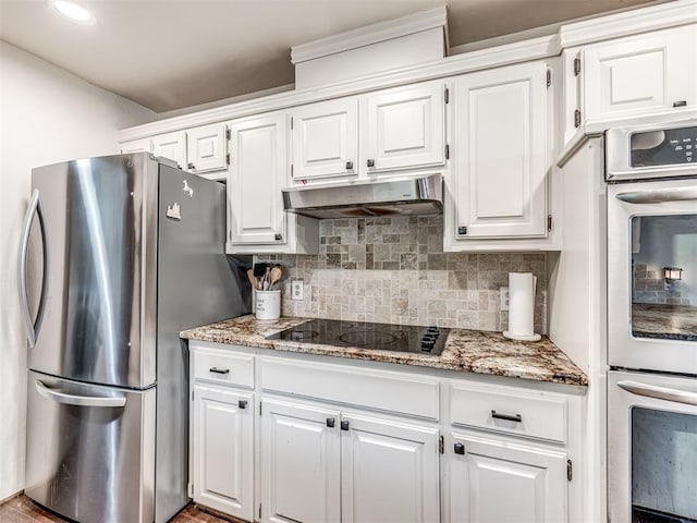 8001 84th St, Noble, OK 73068 - kitchen with stainless steel appliances and white cabinets