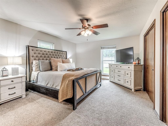 8001 84th St, Noble, OK 73068 - bedroom featuring light carpet and a ceiling fan
