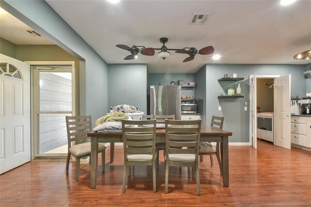 1107 W Windsor Way, Mustang, OK 73064 - dining space featuring a ceiling fan, washer / dryer, wood finished floors, and recessed lighting