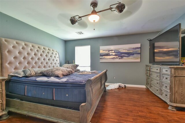 1107 W Windsor Way, Mustang, OK 73064 - bedroom featuring dark wood finished floors and a ceiling fan