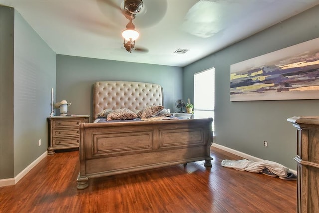 1107 W Windsor Way, Mustang, OK 73064 - bedroom featuring dark wood finished floors and ceiling fan