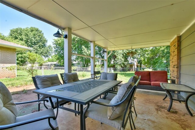 1107 W Windsor Way, Mustang, OK 73064 - fenced backyard with outdoor dining area, a patio, and outdoor lounge area