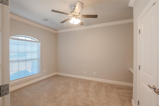 12037 Ashford Dr, Yukon, OK 73099 - empty room with light colored carpet, crown molding, and a ceiling fan