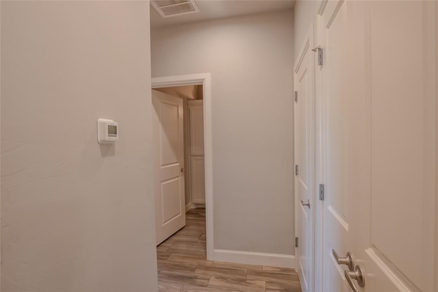12037 Ashford Dr, Yukon, OK 73099 - corridor with baseboards and light wood-style floors