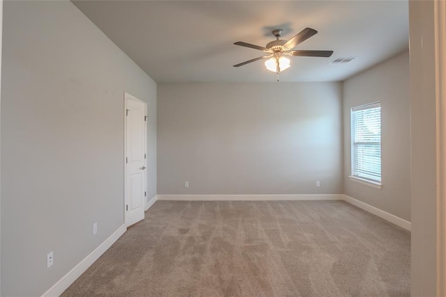 12037 Ashford Dr, Yukon, OK 73099 - unfurnished room with light carpet and a ceiling fan