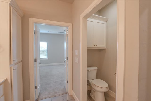 12037 Ashford Dr, Yukon, OK 73099 - bathroom featuring toilet and tile patterned floors
