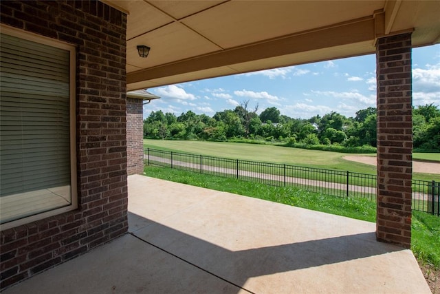 12037 Ashford Dr, Yukon, OK 73099 - view of patio with view of wooded area