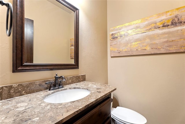 126 Castle Gate Dr, Choctaw, OK 73020 - half bathroom with vanity and a textured wall